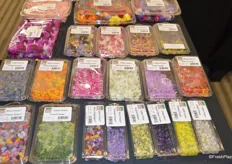 Many different varieties of edible flowers on display in the Fresh Origins booth.